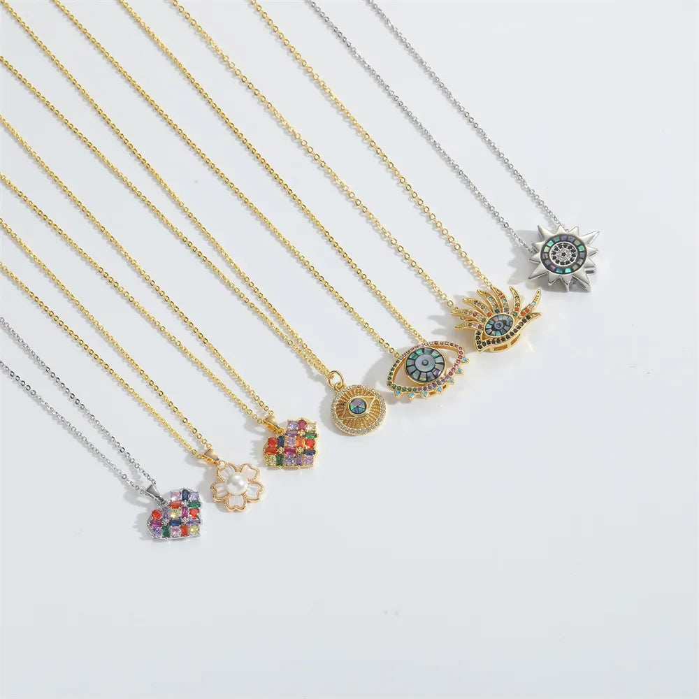 HEART EVIL'S EYE PENDANT | 14K Gold Plated ABS Copper with Enamel & Zircon Flower Design