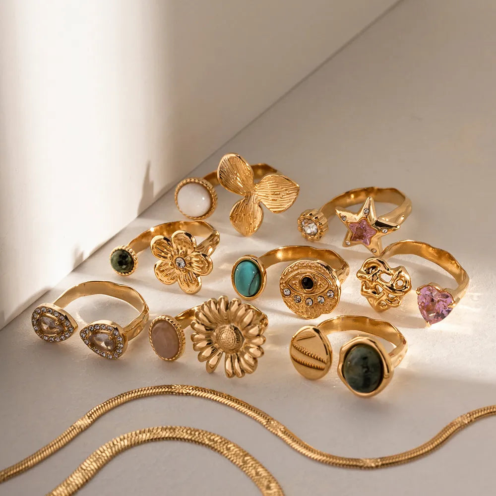 BLOOM MISMATCH | ASYMMETRICAL ZIRCON FLOWER RING IN 304 STAINLESS STEEL